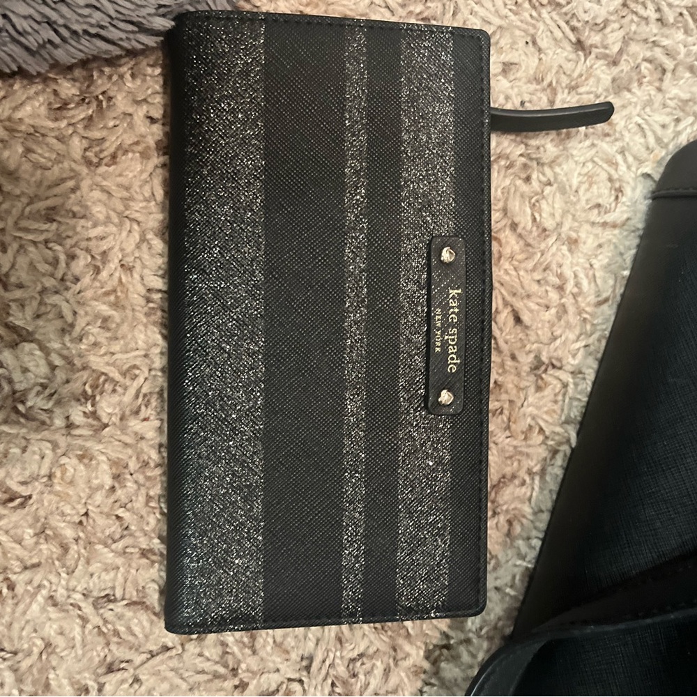 Black kate spade wallet used a handful of time